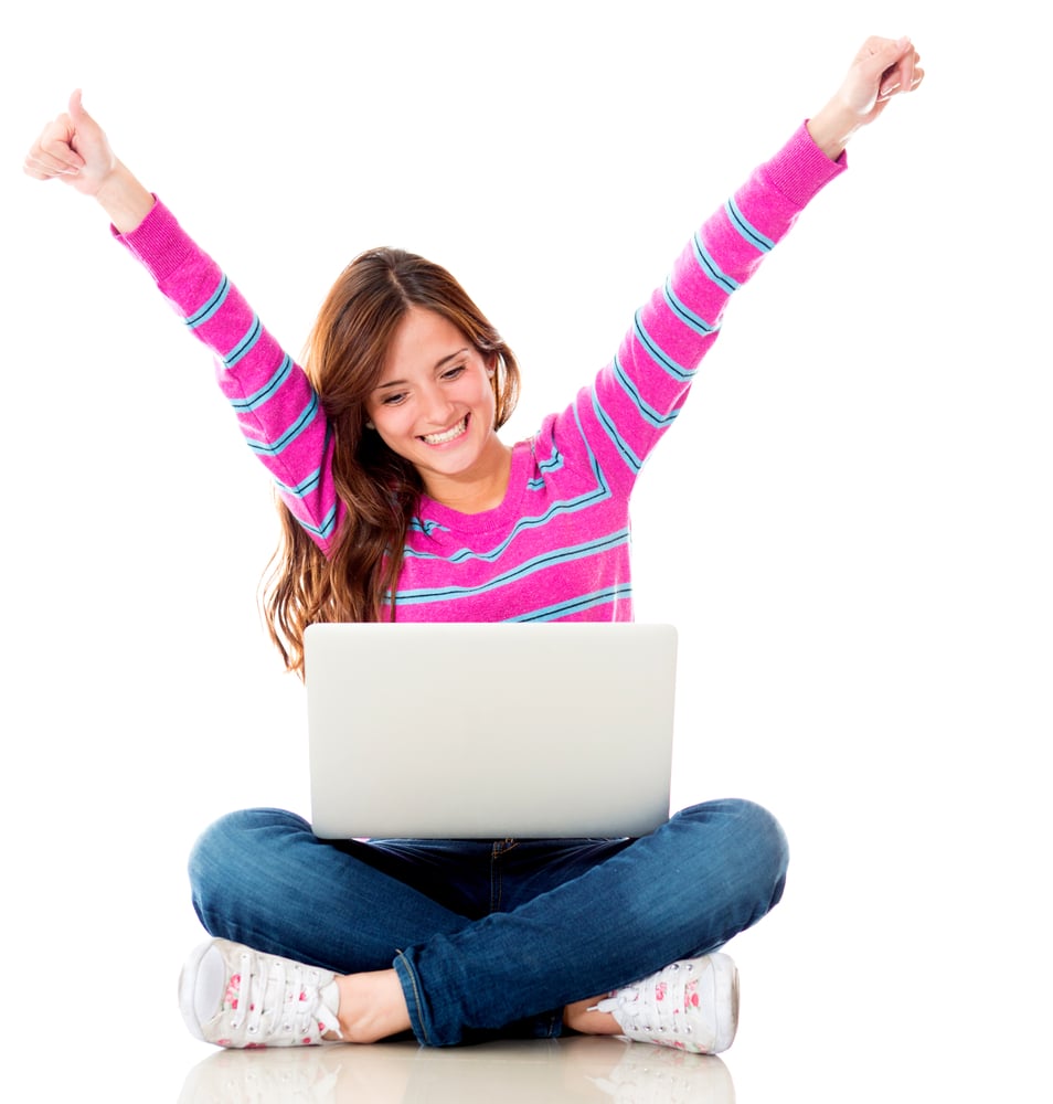 Happy woman online on a laptop computer - isolated over white background