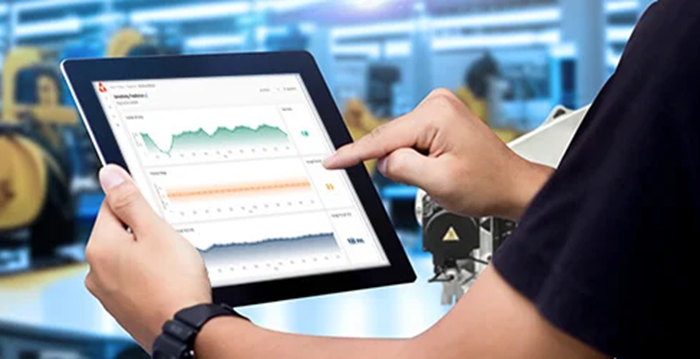 Man and tablet showing Altair’s MRO solution for aerospace.